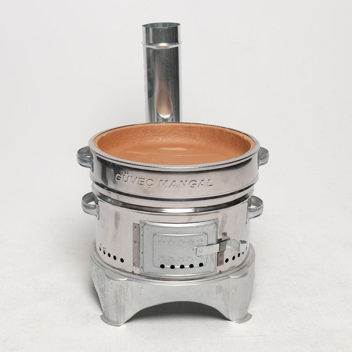 The HAKAN Portable Guvec Mangal Soba Clay Grill Barbecue Stove. 