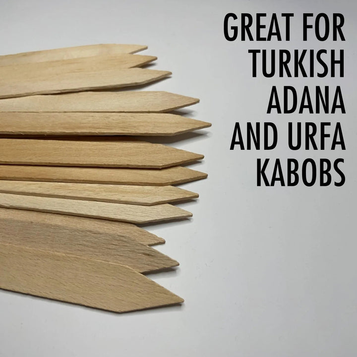 Arranged diagonally on a white background, Great for Turkish Adana and Urfa kabobs reads the text next to 9.8-inch Hakan wooden skewers (100-pack). Perfect BBQ companions, these HAKAN grill skewers enhance any outdoor feast.